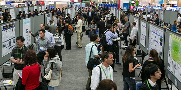 AACR Annual Meeting 2014 attendees during a poster session.